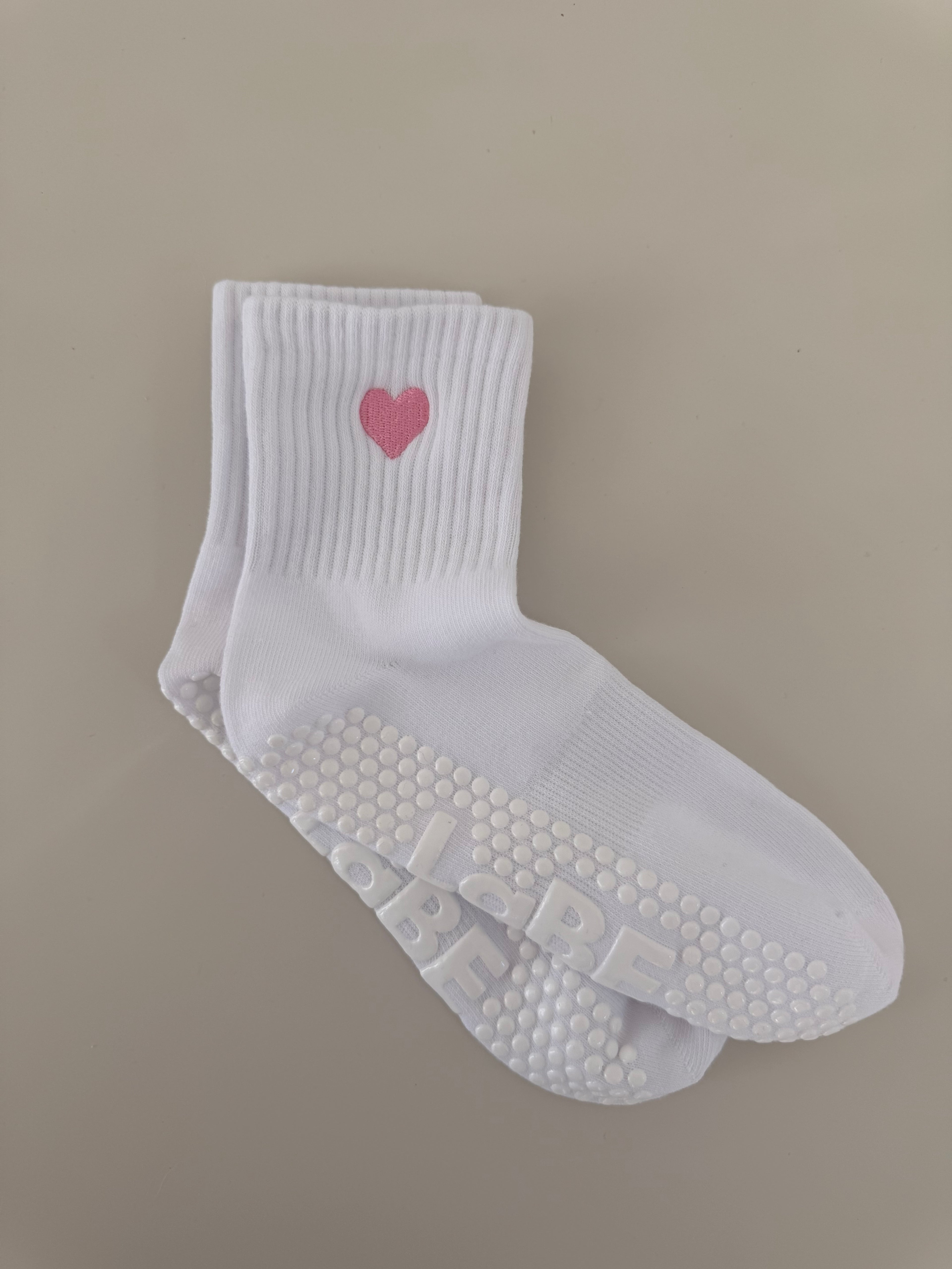 Gripsocke weiß mit Herz in pink